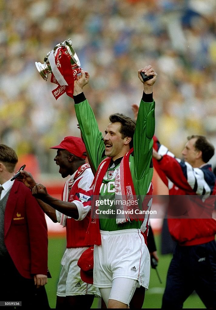 David Seeman Arsenal goalkeeper David Seaman celebrates with the trophy after ...