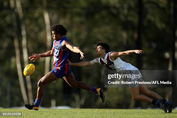 Isaac Quaynor of Oakleigh Chargers kicks during the TAC Cup round 15 match between Oakleigh Chargers and Sandringham Dragons at Avalon Airport Oval...