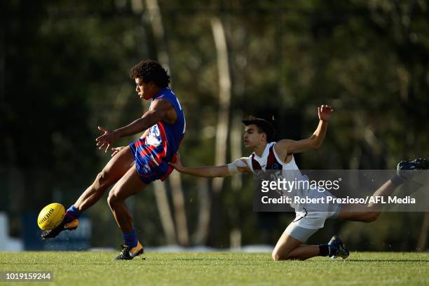 Isaac Quaynor of Oakleigh Chargers kicks during the TAC Cup round 15 match between Oakleigh Chargers and Sandringham Dragons at Avalon Airport Oval...