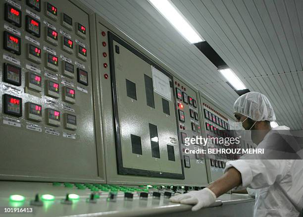 An Iranian technician works at the control room of the Isfahan Uranium Conversion Facilities , 420 kms south of Tehran, 03 February 2007. Iran opened...