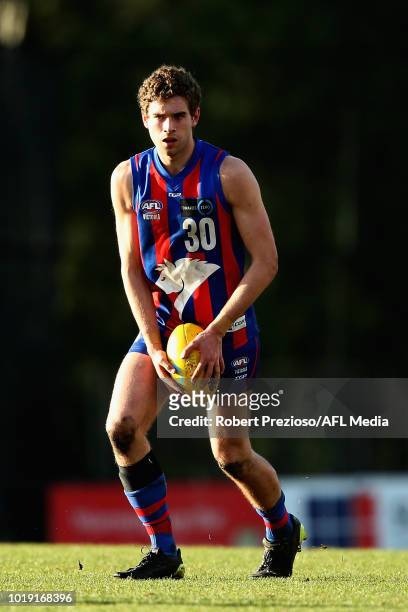 Bailey Wraith of Oakleigh Chargers runs during the TAC Cup round 15 match between Oakleigh Chargers and Sandringham Dragons at Avalon Airport Oval on...