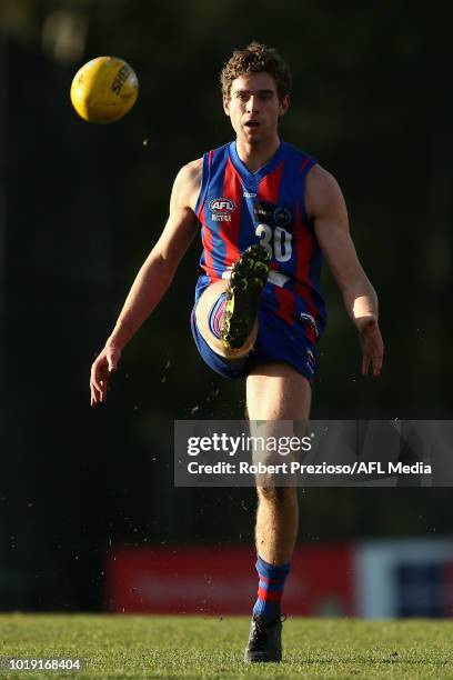 Bailey Wraith of Oakleigh Chargers kicks during the TAC Cup round 15 match between Oakleigh Chargers and Sandringham Dragons at Avalon Airport Oval...