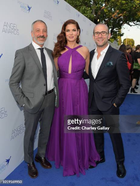 David Kohan, Debra Messing and Max Mutchnick attend Project Angel Food's 2018 Angel Awards on August 18, 2018 in Hollywood, California.