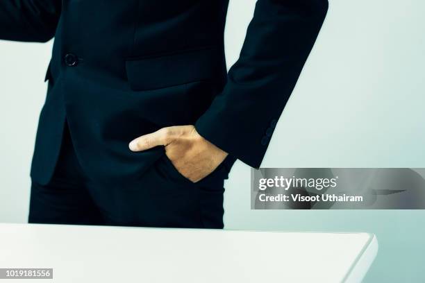 closeup businessman hands in pockets. - hands in pockets foto e immagini stock