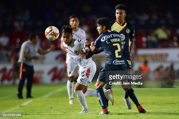 Jose Flores of Veracruz and Carlos Vargas of America fight for the ball during a match between Veracruz and Club America as part of Copa MX Apertura...