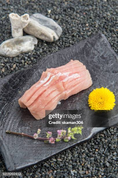 sushi japanese style on traditional plate - ginger above nobody stock pictures, royalty-free photos & images