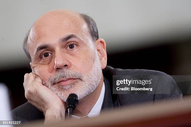Ben S. Bernanke, chairman of the U.S. Federal Reserve, listens during a House Budget Committee hearing on the state of the economy in Washington,...