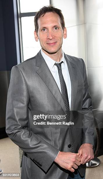 Actor Stephen Kunken poses as Tony Award nominees visit The Empire State Building on June 9, 2010 in New York City.