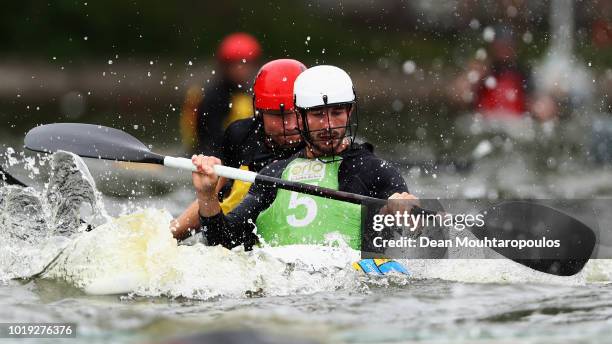 Alexandre Massot of Acigne 1 battles for the ball with Tjerk Webbers of Rijnland A during the GEKKO International Canoe Kayak Polo Tournament match...