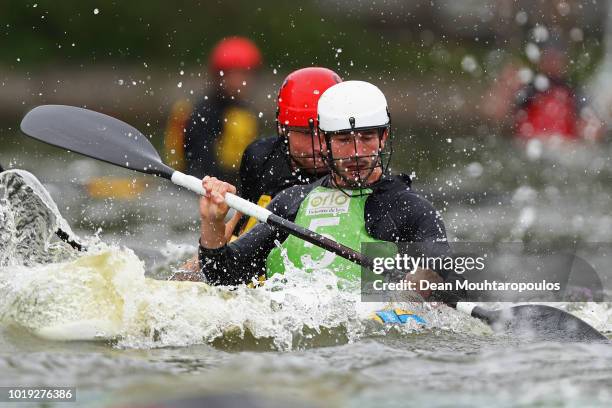 Alexandre Massot of Acigne 1 battles for the ball with Tjerk Webbers of Rijnland A during the GEKKO International Canoe Kayak Polo Tournament match...