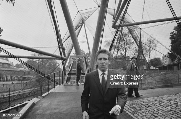 British photographer and film-maker Antony Armstrong-Jones, 1st Earl of Snowdon , near the 'Snowdon Aviary', his design at the London Zoo, UK, 27th...
