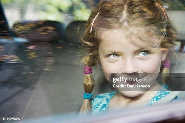 6 year old girl in car - portrait - smirk stock pictures, royalty-free photos & images