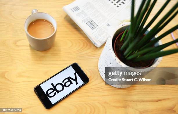 Close up of a mobile phone displaying the eBay mobile app on May 30 in London, England. EBay remains at the forefront of online retail. The...