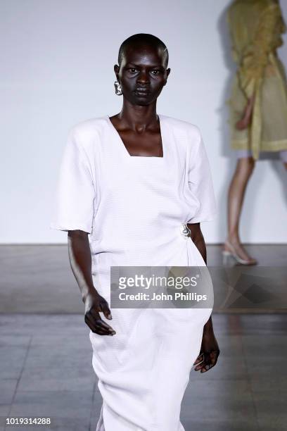 Model walks the runway at the Moire show during Oslo Runway SS19 at Bankplassen 4 on August 15, 2018 in Oslo, Norway.