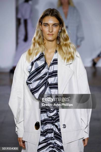 Model walks the runway at the Moire show during Oslo Runway SS19 at Bankplassen 4 on August 15, 2018 in Oslo, Norway.