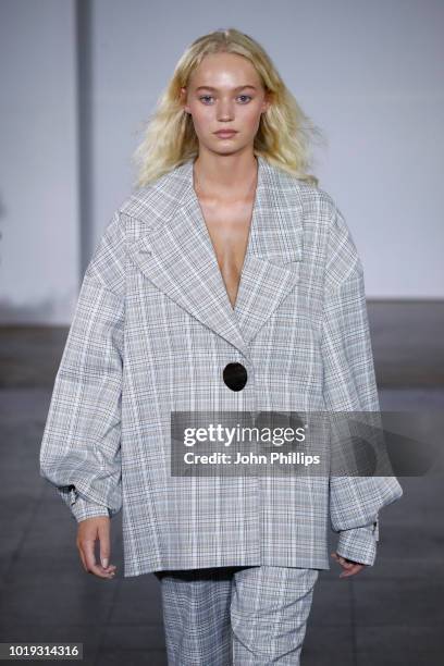 Model walks the runway at the Moire show during Oslo Runway SS19 at Bankplassen 4 on August 15, 2018 in Oslo, Norway.