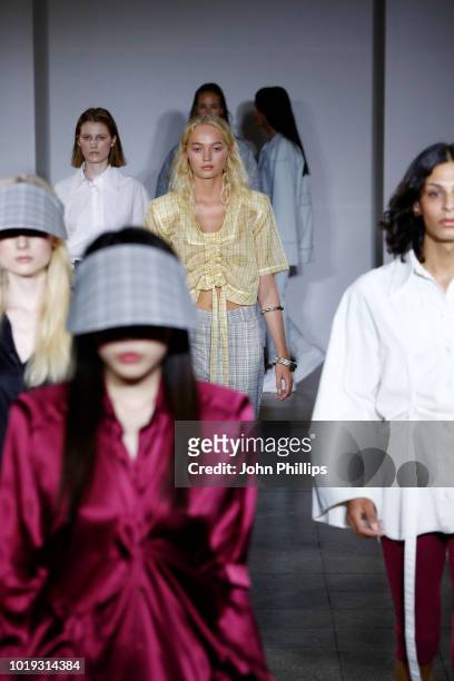 Models walk the runway at the Moire show during Oslo Runway SS19 at Bankplassen 4 on August 15, 2018 in Oslo, Norway.