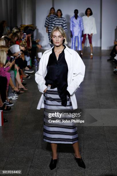 Models walk the runway at the Moire show during Oslo Runway SS19 at Bankplassen 4 on August 15, 2018 in Oslo, Norway.