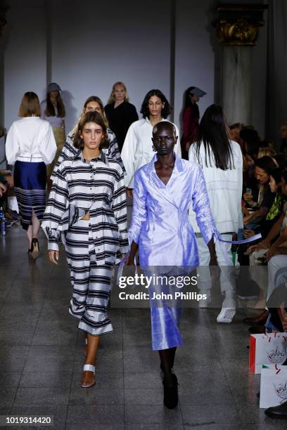 Models walk the runway at the Moire show during Oslo Runway SS19 at Bankplassen 4 on August 15, 2018 in Oslo, Norway.