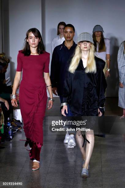 Models walk the runway at the Moire show during Oslo Runway SS19 at Bankplassen 4 on August 15, 2018 in Oslo, Norway.
