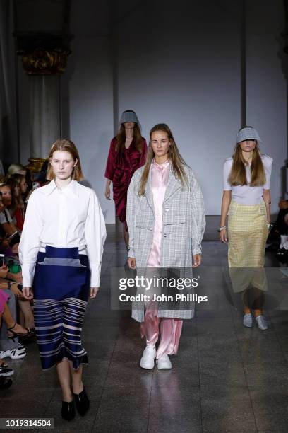 Models walk the runway at the Moire show during Oslo Runway SS19 at Bankplassen 4 on August 15, 2018 in Oslo, Norway.