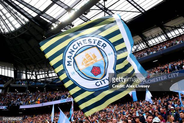 Manchester City flag is seen during the Premier League match between Manchester City and Huddersfield Town at Etihad Stadium on August 19, 2018 in...