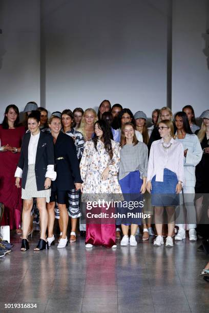 Designer Charlotte Fische and models acknowledge the applause of the audience after the Moire show during Oslo Runway SS19 at Bankplassen 4 on August...