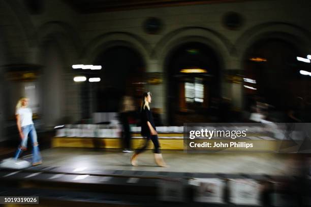 Models walk the runway during the rehearsal ahead of the Moire show during Oslo Runway SS19 at Bankplassen 4 on August 15, 2018 in Oslo, Norway.