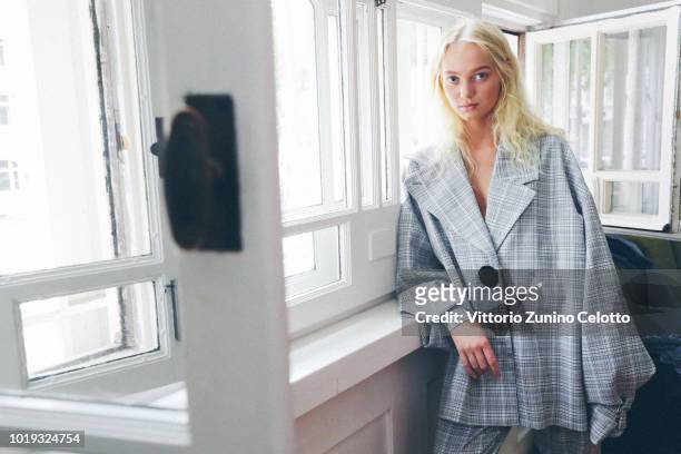 Model backstage ahead of the Moire show during Oslo Runway SS19 at Bankplassen 4 on August 15, 2018 in Oslo, Norway.