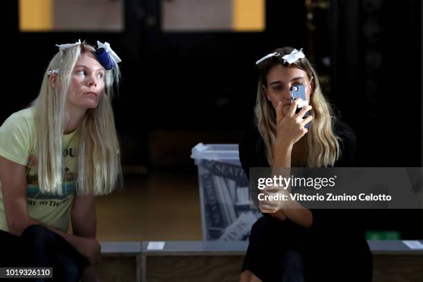 Models backstage ahead of the Moire show during Oslo Runway SS19 at Bankplassen 4 on August 15, 2018 in Oslo, Norway.