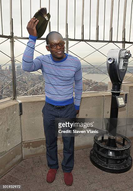 Tony Awards nominee Sahr Ngaujah visits The Empire State Building on June 9, 2010 in New York City.