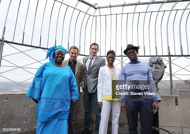 Tony Awards nominees Lillias White, Chad Kimball, Stephen Kunken, Montego Glover and Sahr Ngaujah visit The Empire State Building on June 9, 2010 in...