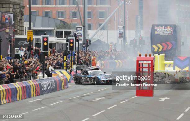 Dean Kearney of Ireland displays his precision driving as he competes at Red Bull Drift Shifters, the UKÕs biggest and loudest drifting event on...