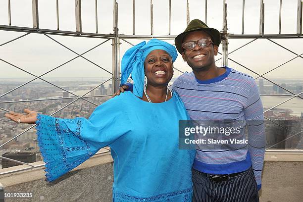 Tony Awards nominees Lillias White and Sahr Ngaujah visit The Empire State Building on June 9, 2010 in New York City.