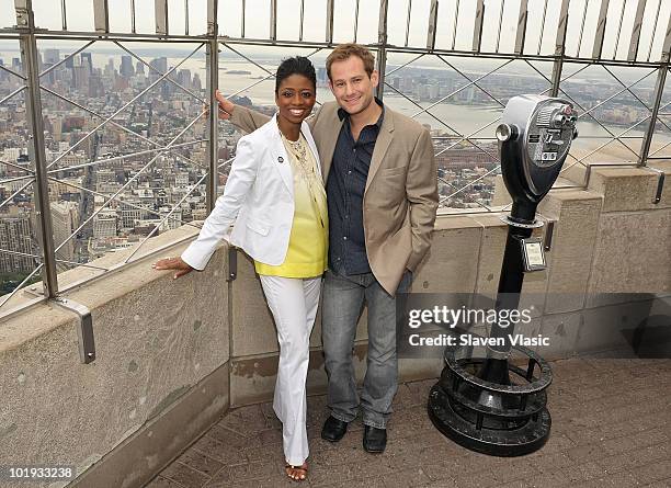 Tony Awards nominees Montego Glover and Chad Kimball visit The Empire State Building on June 9, 2010 in New York City.