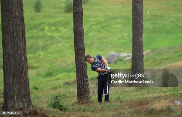Robert Rock of England plays his second shot on the 14th hole during day four of the Nordea Masters at Hills Golf Club on August 19, 2018 in...