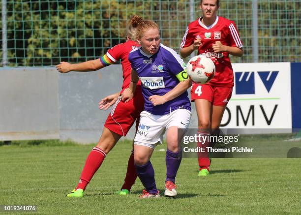 Susanna Koch Lefevre of FC Suedburgenland and Martina Maedl of SG USC Landhaus Austria Wien during the Planet Pure Women Bundesliga match between SG...