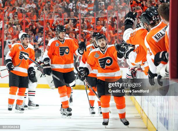 Daniel Briere of the Philadelphia Flyers celebrates assisting on a goal by Scott Hartnell against Chicago Blackhawks during the third period of Game...