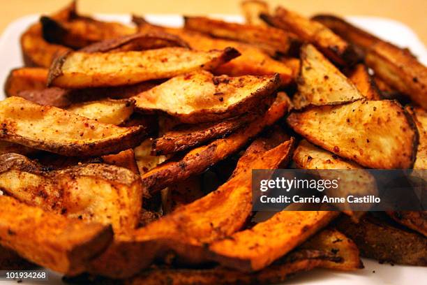 seasoned fries - sweet potato fries stock pictures, royalty-free photos & images