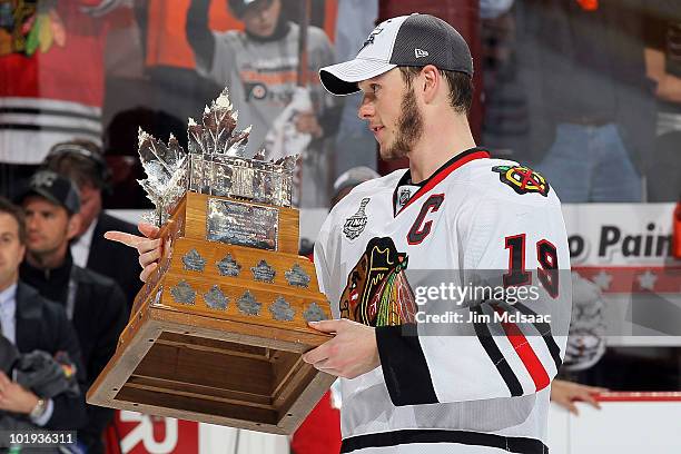 Jonathan Toews of the Chicago Blackhawks is awarded the Conn Smythe Trophy after the Blackhawks defeated the Philadelphia Flyers 4-3 to win the...
