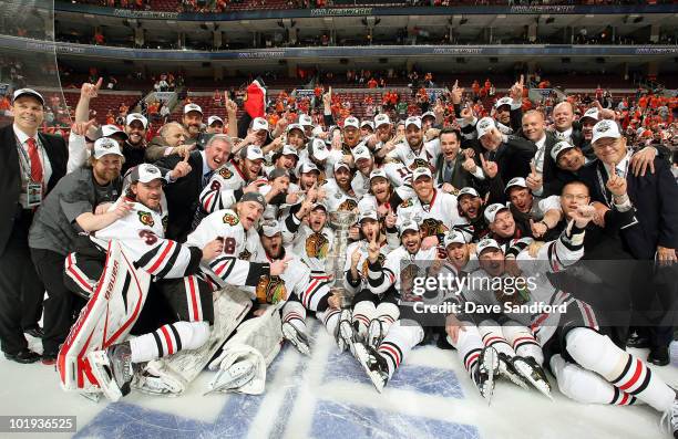 The Chicago Blackhawks celebrate with the Stanley Cup after their 4-3 win in overtime over the Philadelphia Flyers in Game Six of the 2010 NHL...