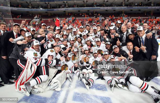 The Chicago Blackhawks celebrate with the Stanley Cup after their 4-3 win in overtime over the Philadelphia Flyers in Game Six of the 2010 NHL...