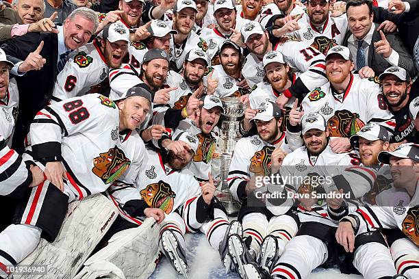 The Chicago Blackhawks celebrate with the Stanley Cup after their 4-3 win in overtime over the Philadelphia Flyers in Game Six of the 2010 NHL...