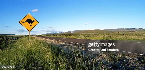 australia, south australia, kangaroo crossing sign along highway - main road stock pictures, royalty-free photos & images