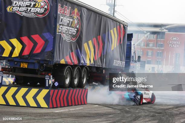 Piotr Wiecek of Poland displays his precision driving as he competes at Red Bull Drift Shifters, the UKÕs biggest and loudest drifting event on...