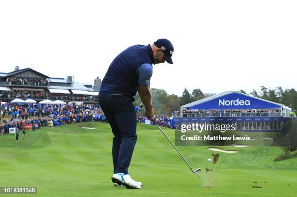 Paul Waring of England plays his second shot on the 18th hole during day four of the Nordea Masters at Hills Golf Club on August 19, 2018 in...