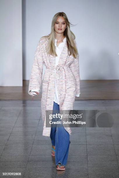 Model walks the runway at the Line of Oslo show during Oslo Runway SS19 at Bankplassen 4 on August 15, 2018 in Oslo, Norway.