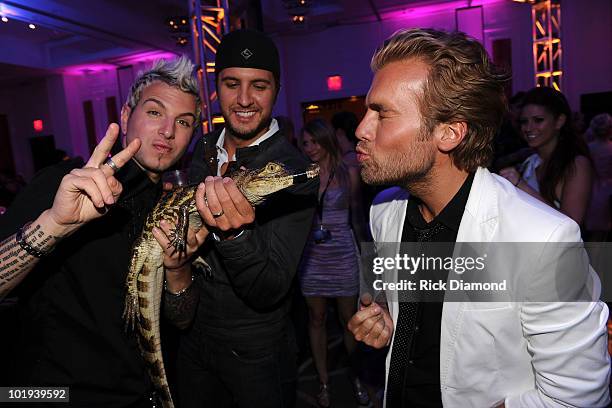 Luck Bryan with Tom Gossin and Mike Gossin of Gloriana at the 2010 CMT Music Awards after party at the Hutton Hotel on June 9, 2010 in Nashville,...