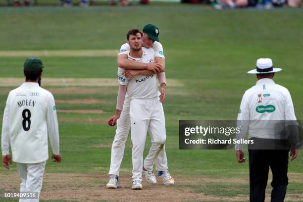 Worcestershire's Tom Fell congratulates Worcestershire's Ed Bernard during day one of the Specsavers Championship Division One match between...