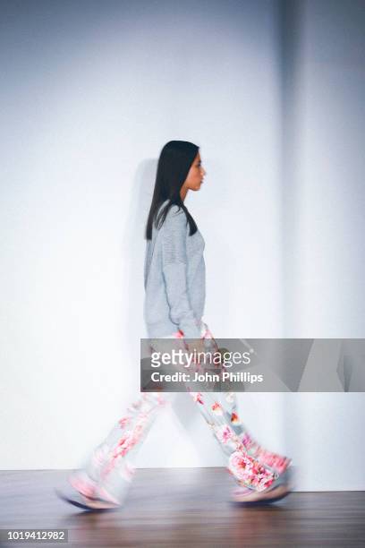 Model walks the runway at the Line of Oslo show during Oslo Runway SS19 at Bankplassen 4 on August 15, 2018 in Oslo, Norway.